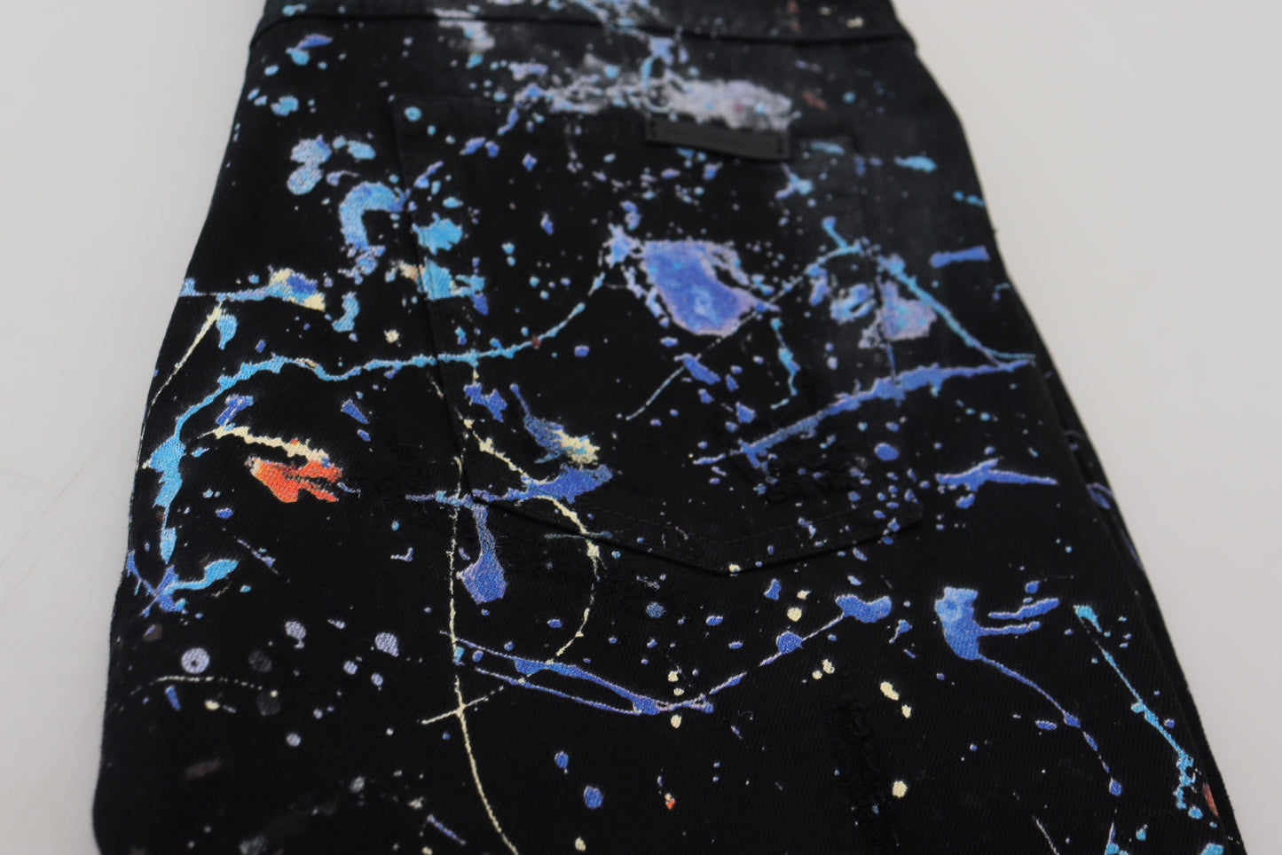 Dolce & Gabbana Jeanshose mit exquisitem Farbspritzer-Print