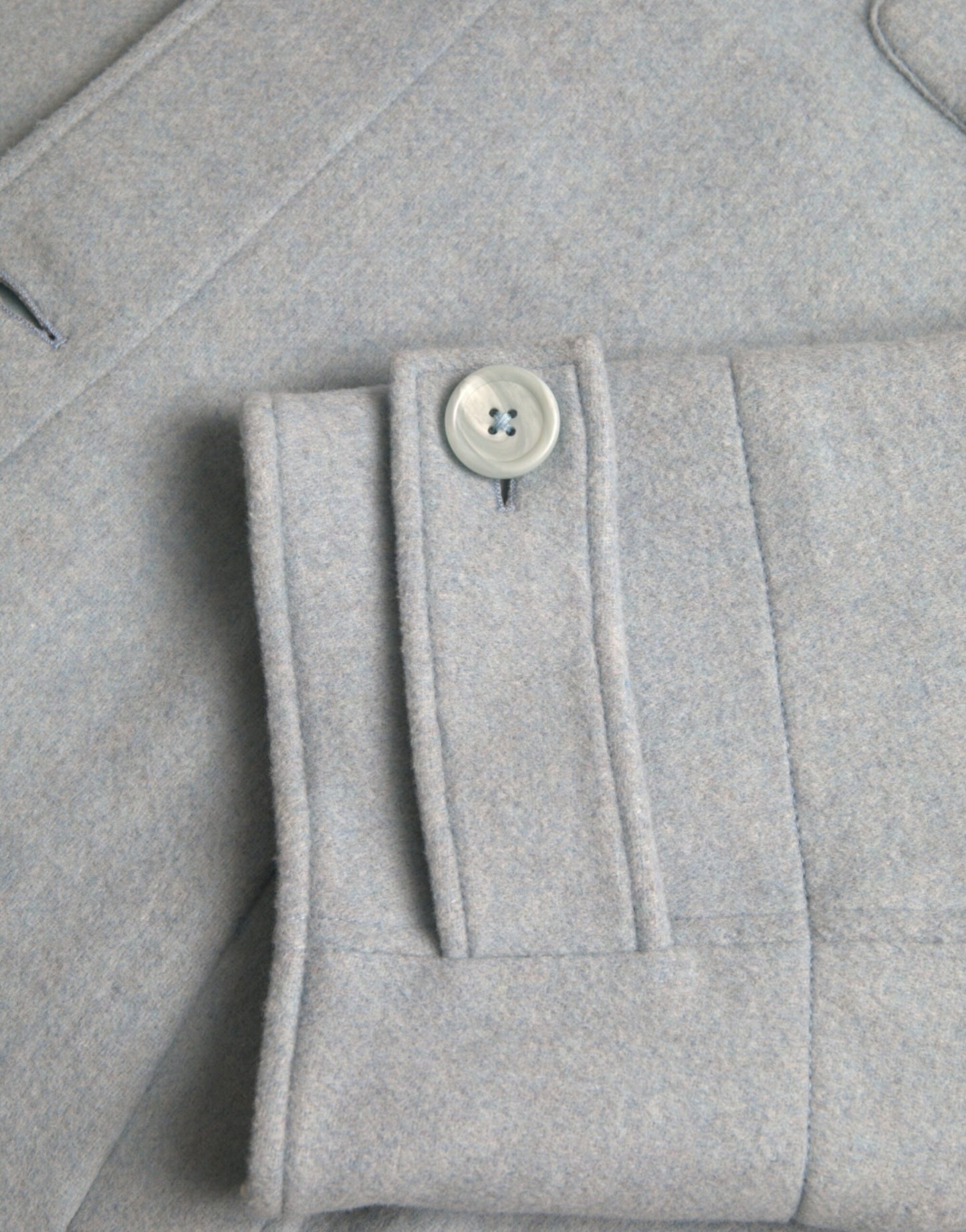 Dolce & Gabbana – Hellblaue Trenchcoat-Jacke aus Wolle mit Knöpfen