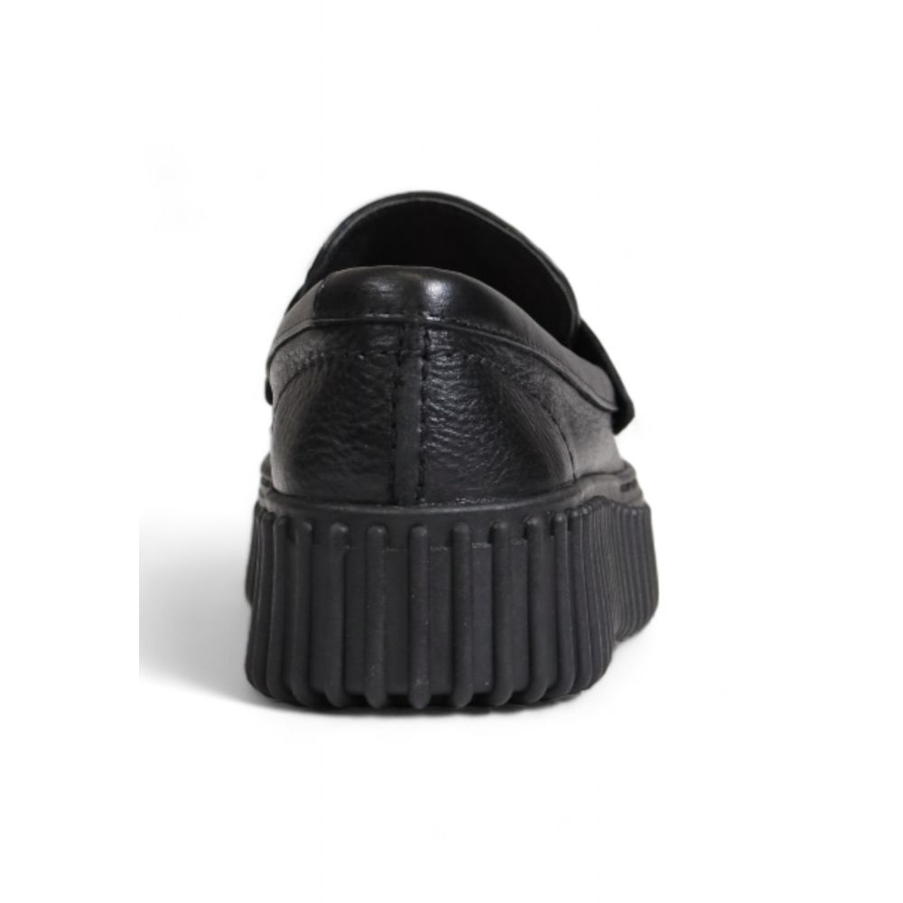 Clarks – Flache Schuhe aus schwarzem Leder
