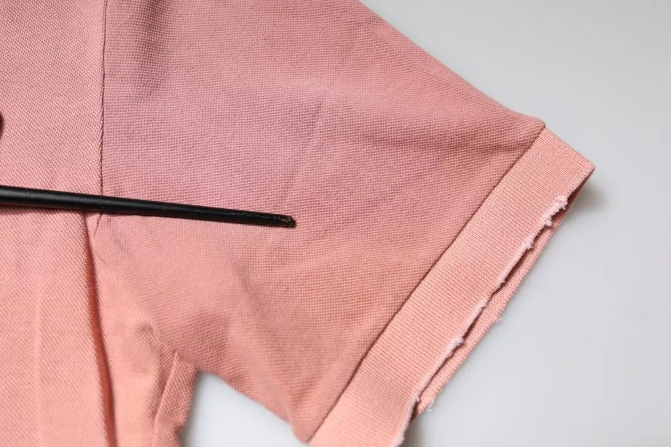 Dolce & Gabbana – Kurzärmliges Poloshirt mit rosa Kronenkragen