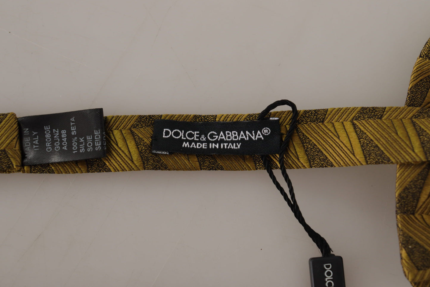 Dolce &amp; Gabbana Elegante goldene Seidenfliege