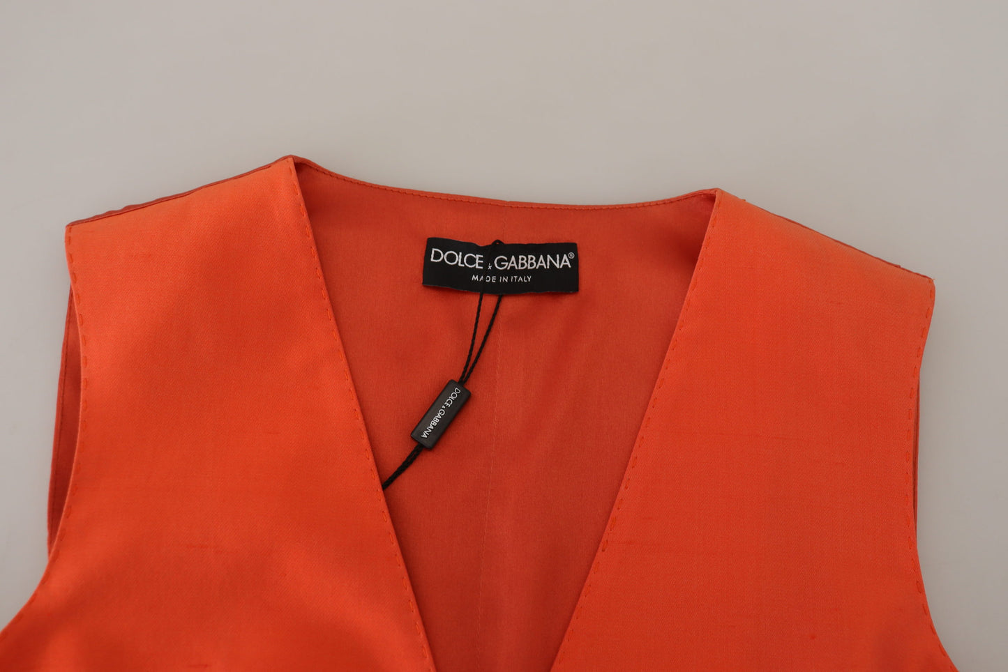 Dolce &amp; Gabbana Elegante orangefarbene Seidenweste