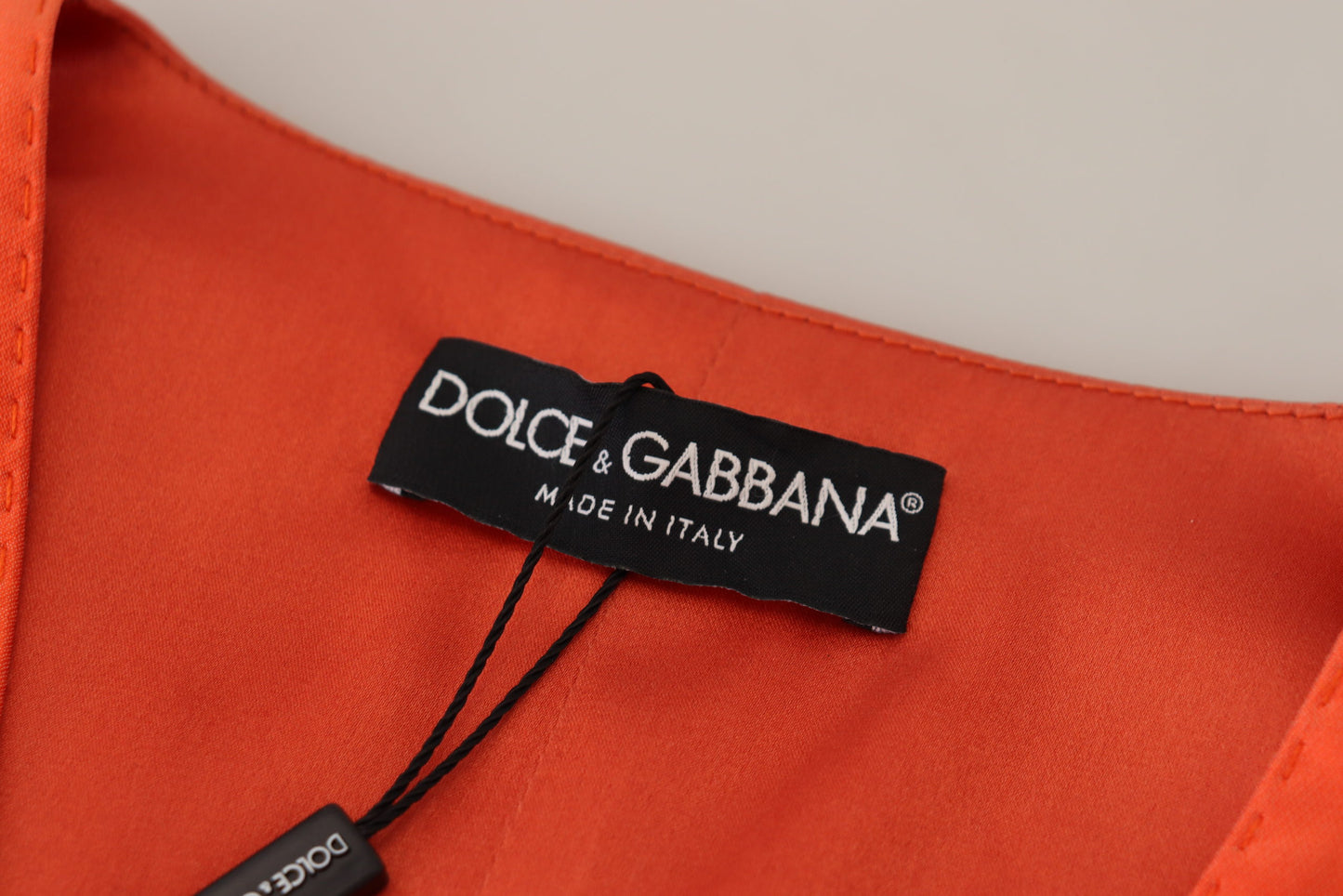 Dolce &amp; Gabbana Elegante orangefarbene Seidenweste