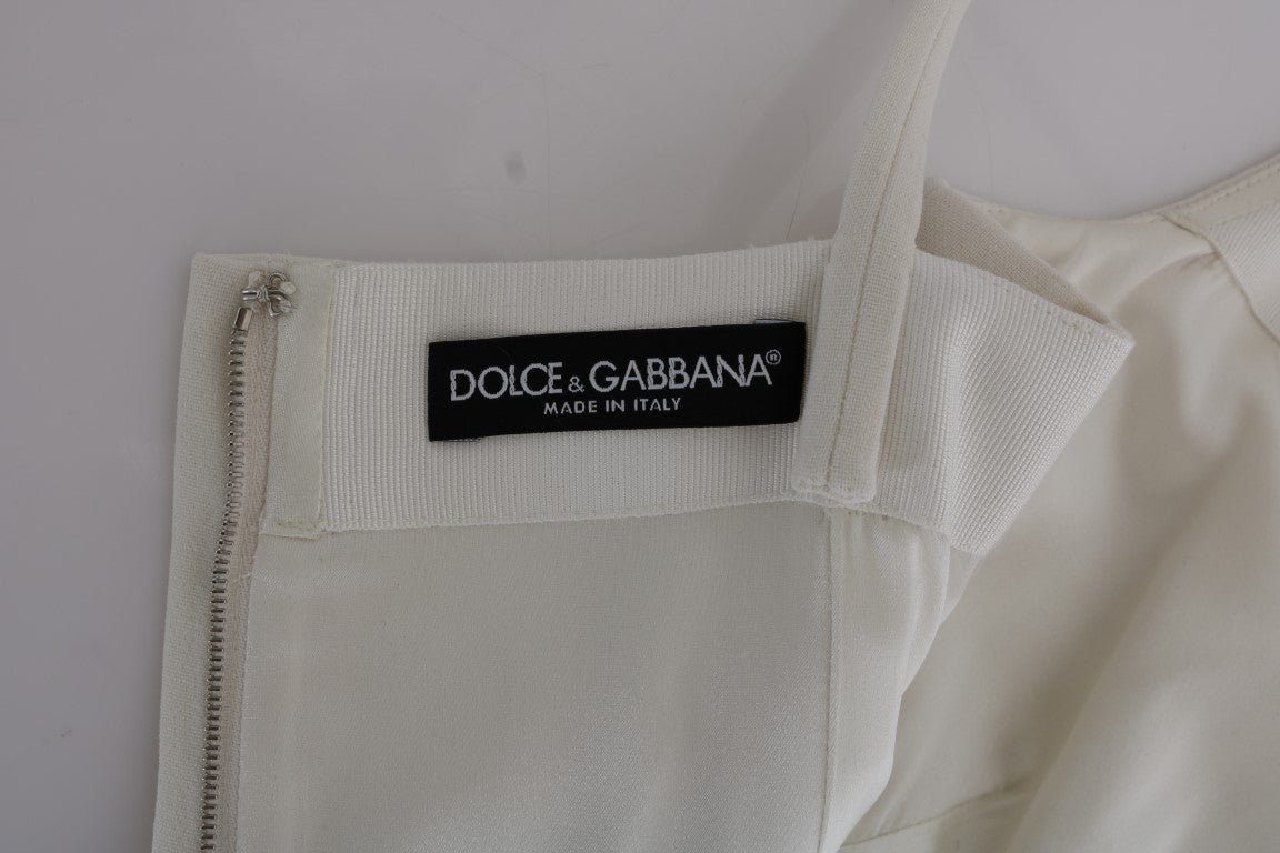 Dolce &amp; Gabbana Elegantes Etuikleid aus weißer Wolle mit goldener Brosche