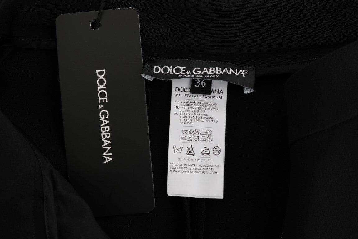 Dolce &amp; Gabbana Schicke schwarze Caprihose mit rosa Seitenstreifen