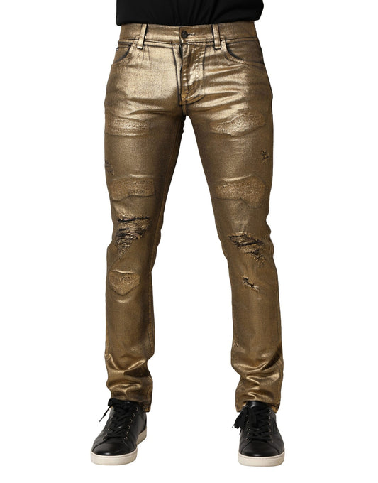 Dolce &amp; Gabbana – Schmal geschnittene Jeans aus zerfetzter Baumwolle mit Stretchanteil in Gold