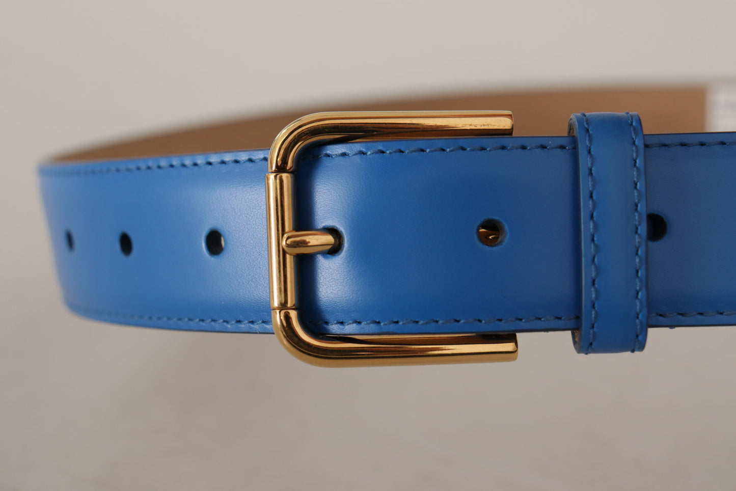 Dolce &amp; Gabbana Eleganter blauer Ledergürtel mit gravierter Schnalle